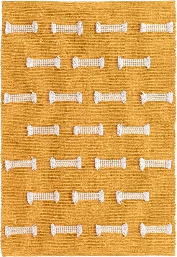 Okrově žlutý pratelný koberec 50x80 cm Juline – douceur d'intérieur