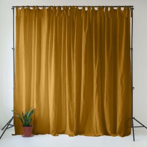 Okrově žlutý/hnědý lněný závěs 140x330 cm Bronze – Linen Tales
