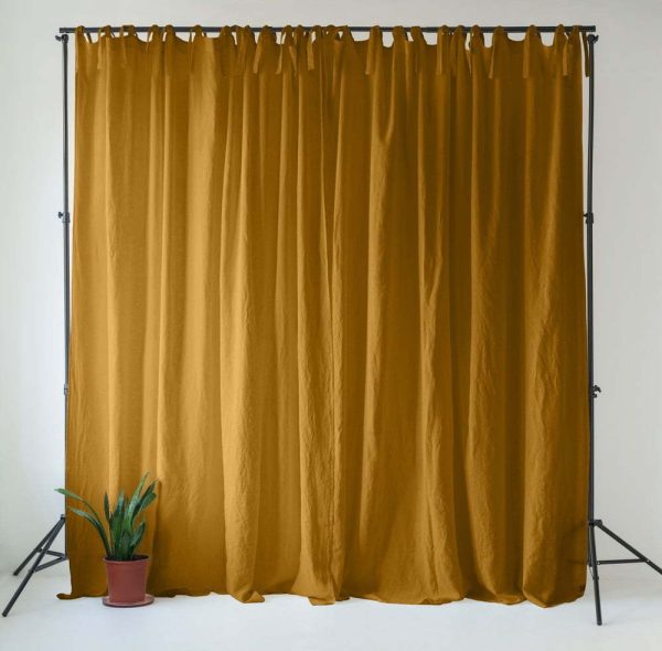 Okrově žlutý/hnědý lněný závěs 140x330 cm Bronze – Linen Tales