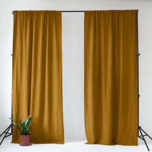 Okrově žlutý/hnědý lněný závěs 140x300 cm Bronze – Linen Tales
