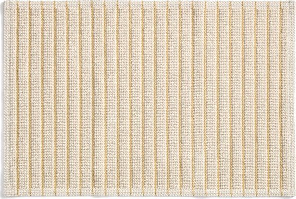 Žlutá/béžová textilní koupelnová předložka 50x80 cm Merade – Kave Home